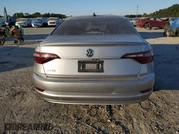 ✅ 2021 Volkswagen Jetta S • VIN: 3VWC57BU4MM100139 • Лот: 92348545. Опубликован ранее на Copart с пробегом 66 088 миль. Бесплатный доступ к архиву аукционных продаж из США и подробный отчёт об истории автомобиля на DreamBid. Изображение 6.