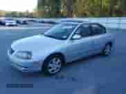 2005 Hyundai Elantra GLS z VIN KMHDN46D65U043418, wystawiony jako Copart lot #74710674 z przebiegiem 243 165 mil mil oraz Czysty tytuł • Clean title. Historia ofert i sprzedaży dostępna na DreamBid. Obrazek 1.