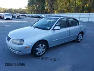 2005 Hyundai Elantra GLS z VIN KMHDN46D65U043418, wystawiony jako Copart lot #74710674 z przebiegiem 243 165 mil mil oraz Czysty tytuł • Clean title. Historia ofert i sprzedaży dostępna na DreamBid. Obrazek 1.