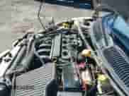 2000 Dodge Neon Highline z VIN 1B3ES46C7YD764572, wystawiony jako IAAI lot #41787703 z przebiegiem 204 657 mil mil oraz . Historia ofert i sprzedaży dostępna na DreamBid. Obrazek 19.