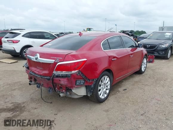 ✅ 2013 Buick LaCrosse Leather • VIN: 1G4GC5E38DF224623 • Lot: 42145182. Listed on IAAI with 89,090 mi. Free auction sales archive from the USA and detailed vehicle history report at DreamBid. Image 4.