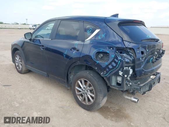 ✅ 2023 Mazda CX-5 S Carbon Edition • VIN: JM3KFBCM6P0165036 • Lot: 42622732. Listed on IAAI with 44,497 mi. Free auction sales archive from the USA and detailed vehicle history report at DreamBid. Image 3.