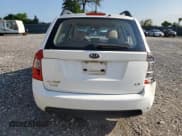 ✅ 2009 Kia Rondo LX • VIN: KNAFG528697261527 • Lot: 86158565. Wystawiony na Copart z przebiegiem 106 437 mil. Bezpłatny archiwum sprzedaży aukcyjnych z USA i szczegółowy raport historii pojazdu na DreamBid. Zdjęcie 6.