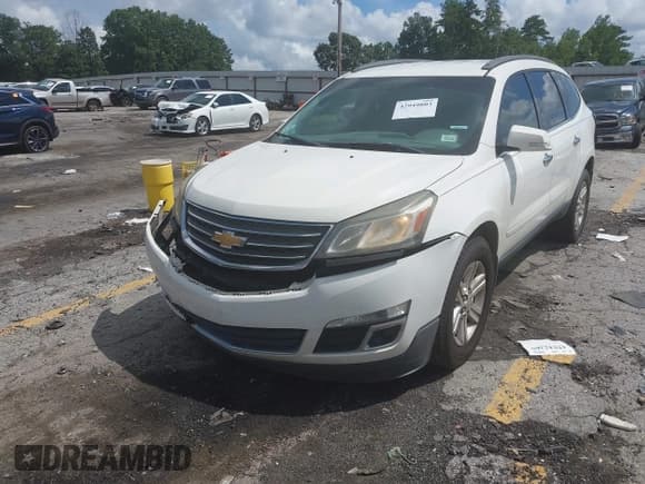 ✅ 2013 Chevrolet Traverse LT • VIN: 1GNKRGKD2DJ164106 • Lot: 42949803. Wystawiony na IAAI z przebiegiem 320 345 mil. Bezpłatny archiwum sprzedaży aukcyjnych z USA i szczegółowy raport historii pojazdu na DreamBid. Zdjęcie 2.