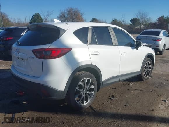 ✅ 2016 Mazda CX-5 Grand Touring • VIN: JM3KE4DY6G0864294 • Lot: 43639964. Wystawiony na IAAI z przebiegiem 119 285 mil. Bezpłatny archiwum sprzedaży aukcyjnych z USA i szczegółowy raport historii pojazdu na DreamBid. Zdjęcie 4.