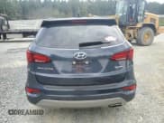 ✅ 2017 Hyundai Santa Fe 2.4L • VIN: 5NMZU3LB2HH031675 • Lot: 81926195. Wystawiony na Copart z przebiegiem 94 775 mil. Bezpłatny archiwum sprzedaży aukcyjnych z USA i szczegółowy raport historii pojazdu na DreamBid. Zdjęcie 6.