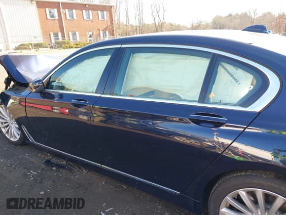 ✅ 2018 BMW 7 Series 740i xDrive • VIN: WBA7E4C54JGV23736 • Lot: 41457470. Listed on IAAI with 70,243 mi. Free auction sales archive from the USA and detailed vehicle history report at DreamBid. Image 14.