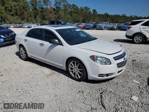 ✅ 2012 Chevrolet Malibu LTZ • VIN: 1G1ZG5E78CF277947 • Lot: 77191294. Listed on Copart with 232,217 mi. Free auction sales archive from the USA and detailed vehicle history report at DreamBid. Image 4.
