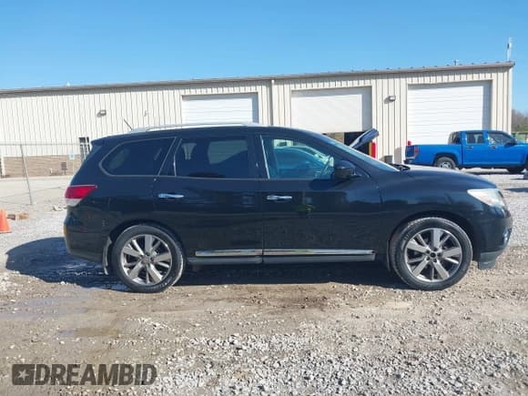 ✅ 2015 Nissan Pathfinder Platinum • VIN: 5N1AR2MM7FC687998 • Lot: 43618859. Listed on IAAI with 136,743 mi. Free auction sales archive from the USA and detailed vehicle history report at DreamBid. Image 13.