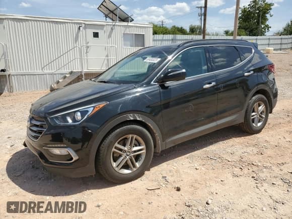 ✅ 2018 Hyundai Santa Fe 2.4L • VIN: 5XYZUDLB7JG537962 • Лот: 65400323. Опубликован ранее на Copart с пробегом 66 859 миль. Бесплатный доступ к архиву аукционных продаж из США и подробный отчёт об истории автомобиля на DreamBid. Изображение 1.
