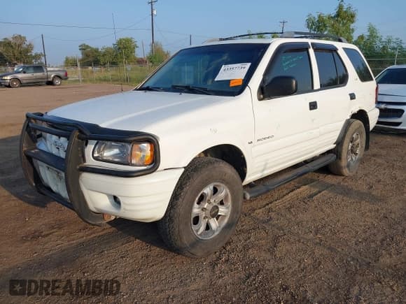 ✅ 2000 Isuzu Rodeo S • VIN: 4S2CK58W1Y4323057 • Lot: 43357739. Listed on IAAI with 147,414 mi. Free auction sales archive from the USA and detailed vehicle history report at DreamBid. Image 17.