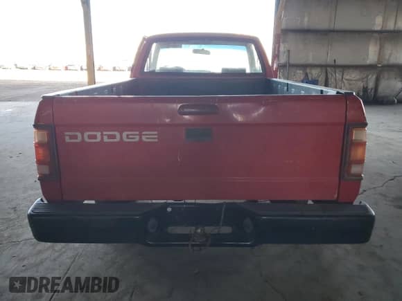 1995 Dodge Dakota z VIN 1B7FL26X2SW902568, wystawiony jako Copart lot #42760295 z przebiegiem 136 528 mil mil oraz Szkoda całkowita • Salvage title. Historia ofert i sprzedaży dostępna na DreamBid. Obrazek 6.