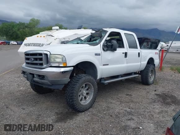 ✅ 2004 Ford F-350 XL • VIN: 1FTSW31P24EC57383 • Lot: 42248001. Listed on IAAI with Not provided. Free auction sales archive from the USA and detailed vehicle history report at DreamBid. Image 2.
