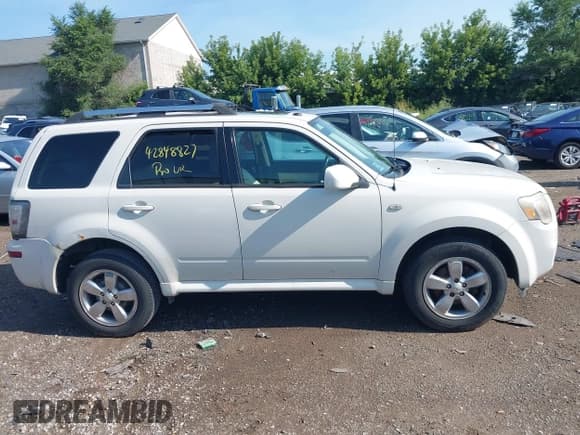 ✅ 2009 Mercury Mariner Premier • VIN: 4M2CU87G99KJ26338 • Лот: 42848827. Опубликован ранее на IAAI с пробегом 153 553 миль. Бесплатный доступ к архиву аукционных продаж из США и подробный отчёт об истории автомобиля на DreamBid. Изображение 13.