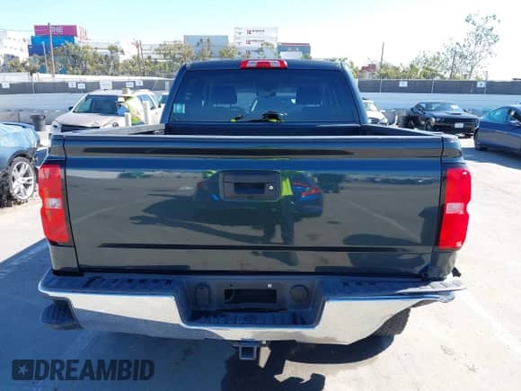 2017 Chevrolet Silverado 1500 LT with VIN 3GCUCRER2HG479128, listed as a IAAI auction lot 43454495 with 85,046 mi miles and . Bid and sale history available at DreamBid. Image 16.