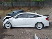 ✅ 2020 Honda Civic Si • VIN: 2HGFC1E54LH704456 • Lot: 42418950. Wystawiony na IAAI z przebiegiem 112 076 mil. Bezpłatny archiwum sprzedaży aukcyjnych z USA i szczegółowy raport historii pojazdu na DreamBid. Zdjęcie 14.