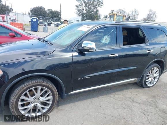 ✅ 2014 Dodge Durango Citadel • VIN: 1C4RDHEG7EC300852 • Lot: 42007888. Listed on IAAI with 128,662 mi. Free auction sales archive from the USA and detailed vehicle history report at DreamBid. Image 16.