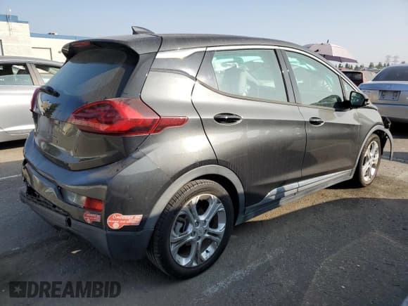 ✅ 2017 Chevrolet Bolt EV LT • VIN: 1G1FW6S04H4148710 • Lot: 75547794. Wystawiony na Copart z przebiegiem 74 678 mil. Bezpłatny archiwum sprzedaży aukcyjnych z USA i szczegółowy raport historii pojazdu na DreamBid. Zdjęcie 3.