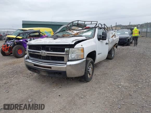 2009 Chevrolet Silverado 2500HD Work Truck z VIN 1GCHK44K69E163090, wystawiony jako IAAI lot #43523477 z przebiegiem 69 802 mil mil oraz . Historia ofert i sprzedaży dostępna na DreamBid. Obrazek 2.