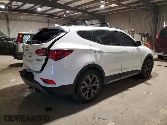 ✅ 2017 Hyundai Santa Fe Ultimate • VIN: 5XYZWDLA2HG408295 • Лот: 78078233. Опубликован ранее на Copart с пробегом 93 502 миль. Бесплатный доступ к архиву аукционных продаж из США и подробный отчёт об истории автомобиля на DreamBid. Изображение 3.
