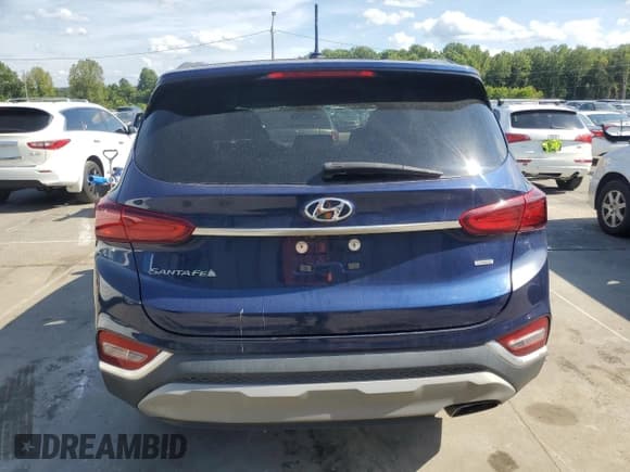 ✅ 2019 Hyundai Santa Fe SE • VIN: 5NMS2CADXKH085583 • Lot: 70084725. Wystawiony na Copart z przebiegiem 137 261 mil. Bezpłatny archiwum sprzedaży aukcyjnych z USA i szczegółowy raport historii pojazdu na DreamBid. Zdjęcie 6.
