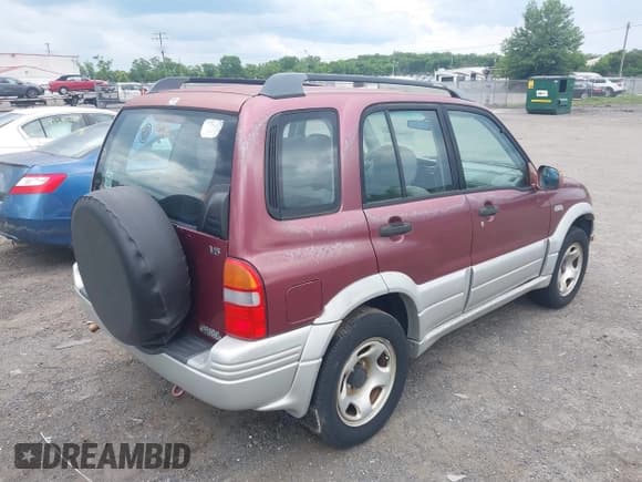 ✅ 2000 Suzuki Grand Vitara JLX • VIN: JS3TD62V7Y4119022 • Лот: 42384608. Опубликован ранее на IAAI с пробегом 153 943 миль. Бесплатный доступ к архиву аукционных продаж из США и подробный отчёт об истории автомобиля на DreamBid. Изображение 4.