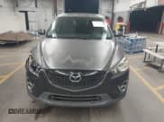 ✅ 2014 Mazda CX-5 Touring • VIN: JM3KE4CY0E0430130 • Lot: 43830898. Wystawiony na IAAI z przebiegiem 169 053 mil. Bezpłatny archiwum sprzedaży aukcyjnych z USA i szczegółowy raport historii pojazdu na DreamBid. Zdjęcie 12.