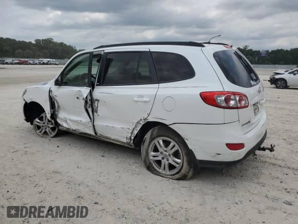 2012 Hyundai Santa Fe GLS с VIN 5XYZG3AB6CG157258, выставлен на аукционе Copart как лот 54052354 с пробегом 223 325 миль миль и На запчасти • Non repairable. История ставок и продаж доступна на DreamBid. Изображение 2.