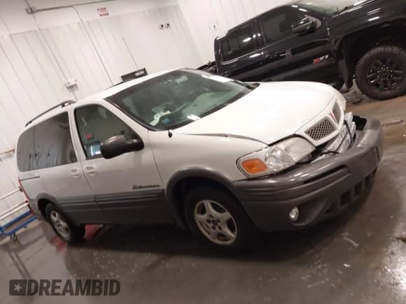 ✅ 2004 Pontiac Montana • VIN: 1GMDU03E74D167012 • Lot: 42211676. Listed on IAAI with 135,644 mi. Free auction sales archive from the USA and detailed vehicle history report at DreamBid. Image 13.