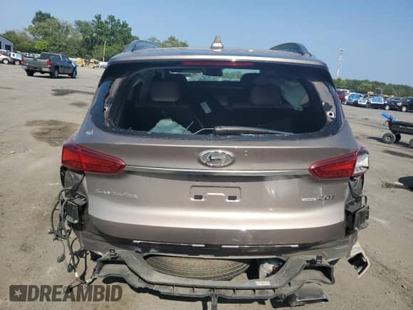 2019 Hyundai Santa Fe Limited z VIN 5NMS5CAA2KH112501, wystawiony jako Copart lot #68364355 z przebiegiem Nie podano mil oraz Szkoda całkowita • Salvage title. Historia ofert i sprzedaży dostępna na DreamBid. Obrazek 6.