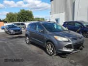 ✅ 2014 Ford Escape Titanium • VIN: 1FMCU0J99EUA85771 • Lot: 91504045. Listed on Copart with 131,245 mi. Free auction sales archive from the USA and detailed vehicle history report at DreamBid. Image 14.
