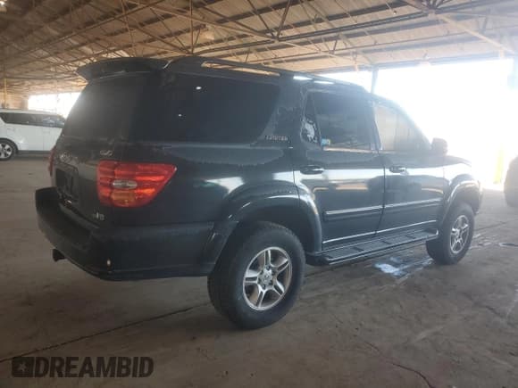 ✅ 2001 Toyota Sequoia Limited • VIN: 5TDBT48A41S056669 • Lot: 90124125. Listed on Copart with 215,530 mi. Free auction sales archive from the USA and detailed vehicle history report at DreamBid. Image 3.
