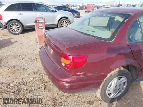 ✅ 2002 Saturn SL • VIN: 1G8ZF52822Z165725 • Lot: 43860858. Listed on IAAI with 191,469 mi. Free auction sales archive from the USA and detailed vehicle history report at DreamBid. Image 6.