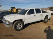 ✅ 2002 Dodge Dakota SLT • VIN: 1B7HL48NX2S560486 • Lot: 84499894. Wystawiony na Copart z przebiegiem 277 151 mil. Bezpłatny archiwum sprzedaży aukcyjnych z USA i szczegółowy raport historii pojazdu na DreamBid. Zdjęcie 1.