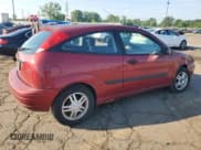 ✅ 2003 Ford Focus ZX3 • VIN: 3FAFP31313R133697 • Lot: 63413015. Listed on Copart with 137,565 mi. Free auction sales archive from the USA and detailed vehicle history report at DreamBid. Image 3.