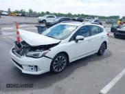 ✅ 2021 Subaru Impreza Limited • VIN: 4S3GTAU63M3706846 • Lot: 42369102. Listed on IAAI with 55,897 mi. Free auction sales archive from the USA and detailed vehicle history report at DreamBid. Image 2.