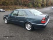 ✅ 1998 Mercedes-Benz C 230/260/280/320 • VIN: WDBHA29G9WA627163 • Lot: 90663845. Listed on Copart with 121,019 mi. Free auction sales archive from the USA and detailed vehicle history report at DreamBid. Image 2.