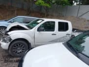 ✅ 2012 Nissan Frontier Pro-4X • VIN: 1N6AD0EV7CC409206 • Lot: 42388170. Listed on IAAI with 126,411 mi. Free auction sales archive from the USA and detailed vehicle history report at DreamBid. Image 14.