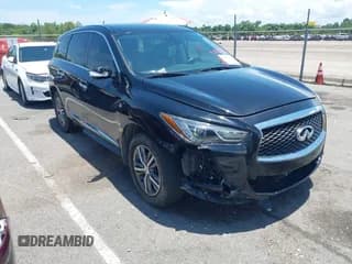 ✅ 2020 Infiniti QX60 Luxe • VIN: 5N1DL0MN0LC523595 • Lot: 42585778. Listed on IAAI with 91,702 mi. Free auction sales archive from the USA and detailed vehicle history report at DreamBid. Image 1.