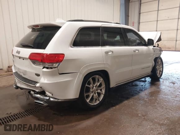 ✅ 2014 Jeep Grand Cherokee Summit • VIN: 1C4RJFJT7EC249398 • Lot: 43241993. Listed on IAAI with 115,708 mi. Free auction sales archive from the USA and detailed vehicle history report at DreamBid. Image 4.