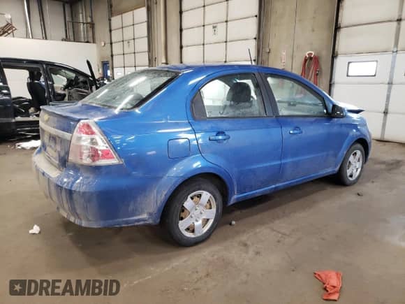 2010 Chevrolet Aveo 1LT z VIN KL1TD5DE9AB051398, wystawiony jako Copart lot #85873554 z przebiegiem 106 426 mil mil oraz Szkoda całkowita • Salvage title. Historia ofert i sprzedaży dostępna na DreamBid. Obrazek 3.