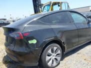 ✅ 2022 Tesla Model Y Long Range • VIN: 7SAYGDEE9NA022842 • Lot: 42003782. Wystawiony na IAAI z przebiegiem 36 010 mil. Bezpłatny archiwum sprzedaży aukcyjnych z USA i szczegółowy raport historii pojazdu na DreamBid. Zdjęcie 4.