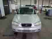 2001 Hyundai Elantra GLS z VIN KMHDN45D61U069948, wystawiony jako Copart lot #69787253 z przebiegiem 251 000 mil mil oraz Szkoda całkowita • Salvage title. Historia ofert i sprzedaży dostępna na DreamBid. Obrazek 5.