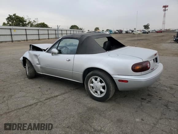 ✅ 1991 Mazda MX-5 Miata Special Edition • VIN: JM1NA3512M0225807 • Лот: 64989974. Опубликован ранее на Copart с пробегом 77 559 миль. Бесплатный доступ к архиву аукционных продаж из США и подробный отчёт об истории автомобиля на DreamBid. Изображение 2.