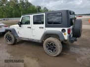 ✅ 2008 Jeep Wrangler Rubicon • VIN: 1J8GA69198L614736 • Lot: 50826545. Listed on Copart with 124,801 mi. Free auction sales archive from the USA and detailed vehicle history report at DreamBid. Image 2.