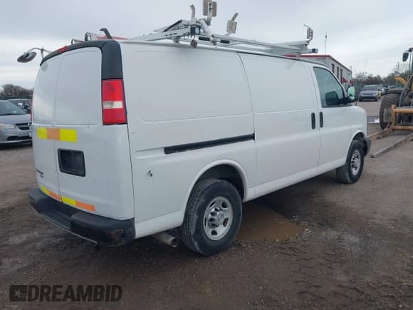 ✅ 2013 Chevrolet Express Cargo • VIN: 1GCWGFCAXD1140635 • Lot: 43410975. Listed on IAAI with 185,343 mi. Free auction sales archive from the USA and detailed vehicle history report at DreamBid. Image 4.
