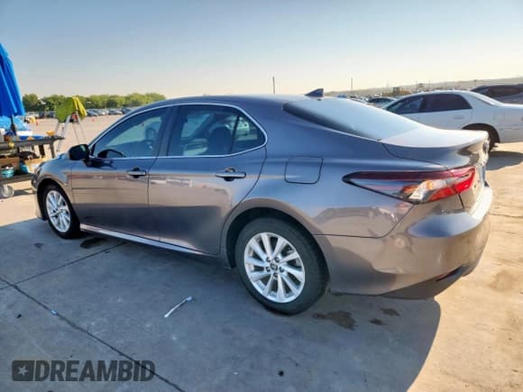 ✅ 2023 Toyota Camry LE • VIN: 4T1C11AK4PU784570 • Lot: 71928825. Wystawiony na Copart z przebiegiem 76 286 mil. Bezpłatny archiwum sprzedaży aukcyjnych z USA i szczegółowy raport historii pojazdu na DreamBid. Zdjęcie 2.