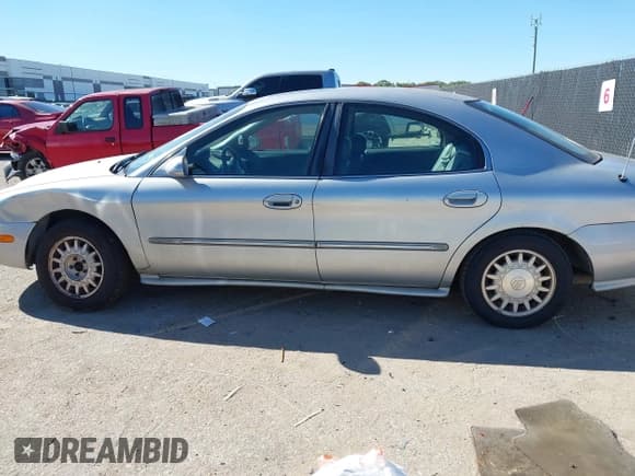 ✅ 1996 Mercury Sable LS • VIN: 1MELM53S8TA639588 • Lot: 43575098. Wystawiony na IAAI z przebiegiem 131 117 mil. Bezpłatny archiwum sprzedaży aukcyjnych z USA i szczegółowy raport historii pojazdu na DreamBid. Zdjęcie 14.