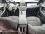 ✅ 2015 Ford Taurus SEL • VIN: 1FAHP2E8XFG101688 • Лот: 85890205. Опубликован ранее на Copart с пробегом 133 425 миль. Бесплатный доступ к архиву аукционных продаж из США и подробный отчёт об истории автомобиля на DreamBid. Изображение 8.