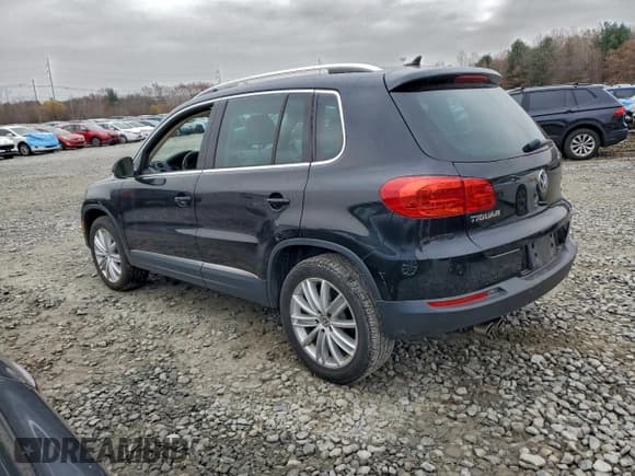 ✅ 2013 Volkswagen Tiguan S • VIN: WVGBV3AX6DW594289 • Lot: 93740985. Listed on Copart with 36,195 mi. Free auction sales archive from the USA and detailed vehicle history report at DreamBid. Image 2.